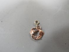 A 9ct rose gold Clogau gold charm