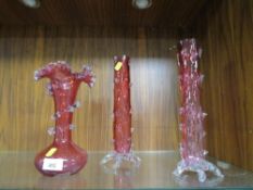 Three pieces of decorative pink glassware