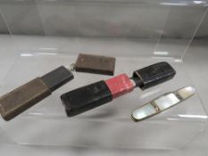 A small box containing 2 hallmarked silver and mother of pearl fruit knives both in cases, a steel