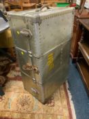 A vintage metal packing trunk
