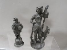 Two small cast figurines