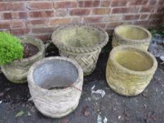 A selection of five large planters