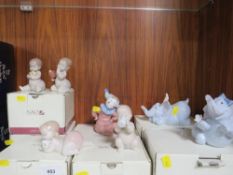 Seven pieces of Nao in original boxes to include two playful elephants