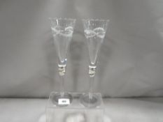 A pair of cut glasses with hallmarked silver bands H 27.5 cm