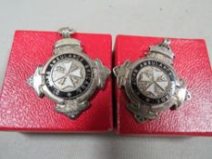 Two silver and enamel St John Ambulance pocket watch chain medals in original boxes