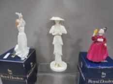 Two boxed Royal Doulton figurines together with a Coalport 