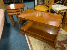 A modern nest of tables and a rectangular two tier table