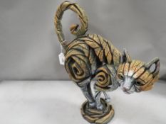 An Edge sculpture by Matt Buckley of a ginger cat