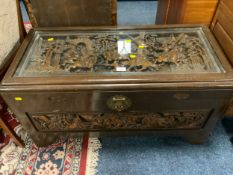 An eastern carved glass topped coffer W 93 cm