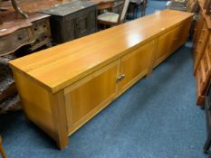 A large modern oak low sideboard H 57 cm L 290 cm
