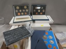 A collection of Royal Mint proof sets 11970's 1990;s, along with a small quantity of uncirculated