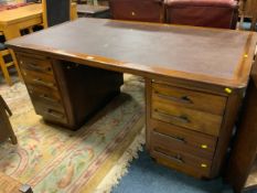 A large twin pedestal desk with leather top W 168 cm