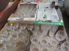 Seven small trays of assorted glassware, mainly drinking glasses etc