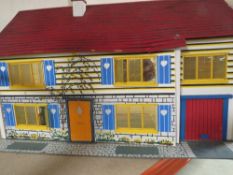 A vintage dolls house and contents A/F