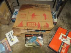 A selection of boxed Black & Decker power tools and a workmate etc