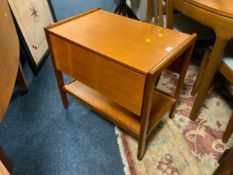 A mid century teak trolley
