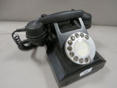 A BAKELITE TELEPHONE, adapted for use on modern BT network