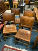A set of four oak studded dining chairs