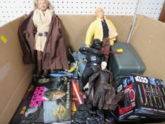 A tray of unboxed Star Wars figures to include Darth Mack and Dark Vader, books, mug, money box etc
