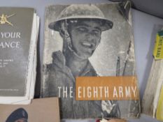 A tray of military ephemera etc to include books, vintage stamp album and correspondence