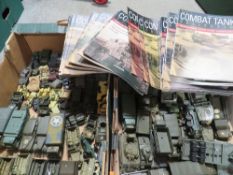 Two trays of mainly Corgi/Solido die cast military vehicles together with a box of Combat tank
