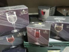 A tray of boxed crystal and wine glasses
