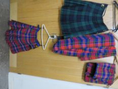 Three kilts to include two McPherson kilts and a Blackwatch kilt - size 34