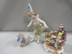 Three figurines to include an angel fish A/F