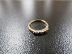 A hallmarked 9 cart gold sapphire and diamond ring approx. weight 1.9g