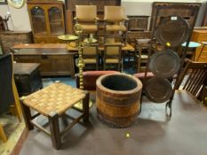 An oak dumb waiter with a stool brass smokers stand and a leather covered planter. (4)