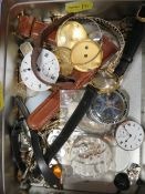 A tin of watch parts, to include a pocket watch chain and an Amber glass swivel fob