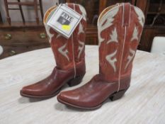 A pair of FRYE hand crafted cowboy boots, dark coloured leather with typical applied country and