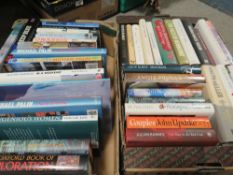 Two trays of assorted hard back books