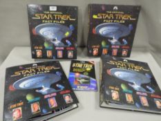 A tray of Star Trek fact files folders and contents