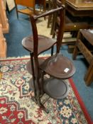 A mahogany inlaid dumb waiter