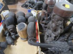 Five trays of African wooden carvings