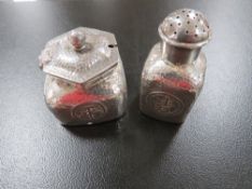 An Oriental silver mustard pot and pepperettes with hammered finish and makers mark stamped to base