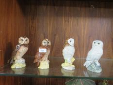 Four Royal Doulton owls