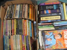 Two trays of science fiction books and magazines