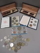 A tray of collectable coins together with two boxed Sheaffe pens