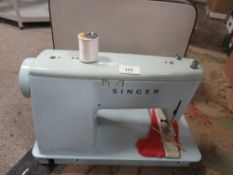 A Vintage cased Singer sewing machine model 347