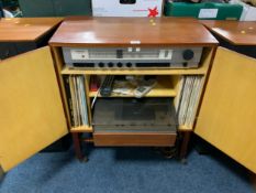 A mid century teak Goodmans stereo together with a Tandberg series 3000 X deck and pair of