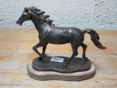 A running horse figure**