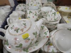 A selection of Wedgwood Wild Strawberry tea/dinner ware to include placemats together with a tray of
