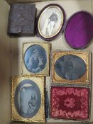 A selection of vintage daguerreotypes, frames etc, to include an unusual ambrotype holder in the