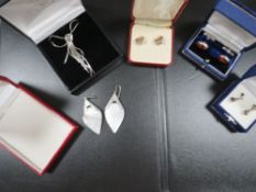 A quantity of boxed silver jewellery, to include an amber set, cufflinks and marcasite cameo