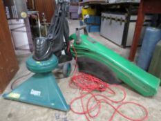 A Coopers leaf vacuum together with a smaller Performance Powerhouse leaf blower / hoover, both in