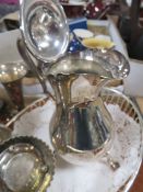 A small tray of assorted metal ware to include a small pair of hallmarked silver squat candlesticks