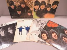 Five assorted Beatles albums to include Revolver, Help, Beatles For Sale, With The Beatles and