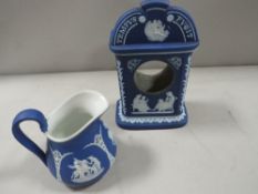 A Wedgwood blue dip mantle clock mount together with a similar small jug (2)